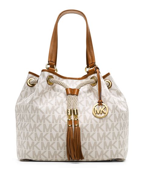 michael kors large tote bag logo|largest michael kors bag.